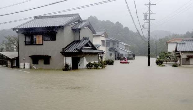 Heavy rains caused by Typhoon Hagibis flood a residential area in Ise, central Japan
