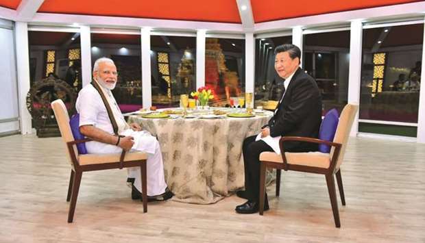 Prime Minister Narendra Modi and Chinese President Xi Jinping during one-on-one tete-a-tete over dinner in Mahabalipuram yesterday.