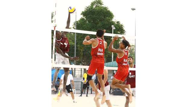 Qataru2019s Cherif Younousse (left) in action during the beach 4x4 volleyball match against Indonesia in ANOC World Beach Games at Al Gharafa Sports Complex yesterday. PICTURE: Jayan Orma