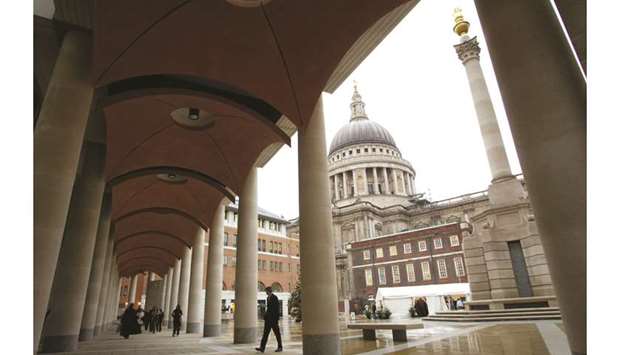 The walkway seen outside the London Stock Exchange building in Paternoster Square. The FTSE 250 on Friday capped its biggest one-day advance since May 2010, with Royal Bank of Scotland Group and Lloyds Banking Group jumping more than 10%.