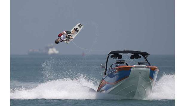 Maxime Roux of France executes a somersault during the Menu2019s  wakeboard qualifiers yesterday.