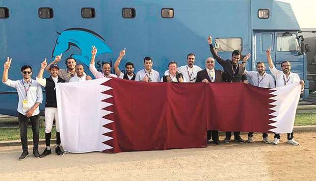 Qataru2019s equestrian team comprising Sheikh Ali al-Thani, Hamad Nasser al-Qadi, Rashid Towaim Ali al-Marri and Bassem Mohammed pose with Qatar Equestrian  Federation and Asian Equestrian Federation President Hamad Abdulrahman al-Attiyah and other officials after finishing second in the Nations Cup at the Morocco Royal Tour in Rabat yesterday.