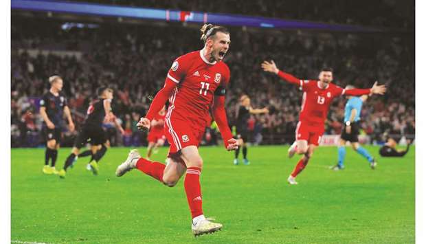 Walesu2019 Gareth Bale celebrates after scoring against Croatia in the Euro 2020 qualifier Group E match in Cardiff, Britain. (Reuters)