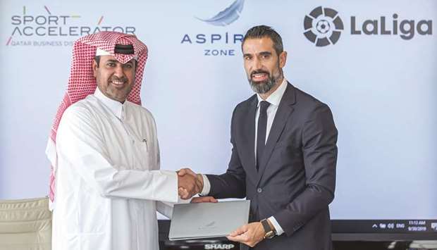 Abdulla Nasser al-Naimi (left), Director General of Aspire Logistics with Fernando Sanz, Director of International Institutional Relations and the La Liga Ambassadors and Legends project.