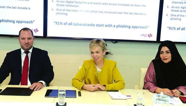 Leonie Ruth Lethbridge (centre) speaks while chief information security officer Benjamin Beaston (left) and head of corporate communications & CSR, marketing Abeer Marwan al-Kalla look on at a press conference. PICTURE: Shemeer Rasheed