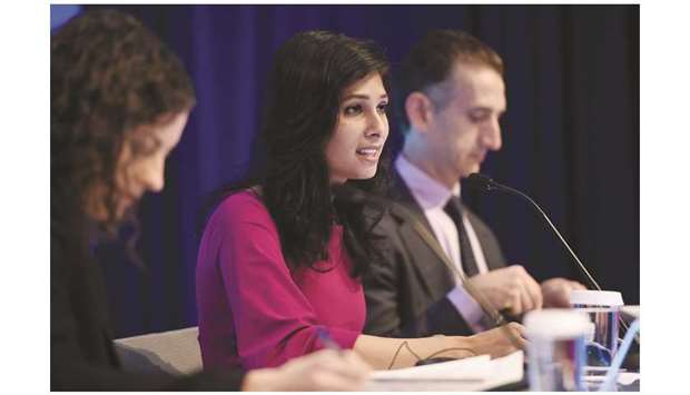 Gita Gopinath, IMF chief economist and director of the Research Department, speaks at a briefing  during the IMF and World Bank Fall Meetings in Washington, DC yesterday. The Fund said its latest World Economic Outlook projections show 2019 GDP growth at 3.0%, down from 3.2% in a July forecast, largely due to increasing fallout from global trade friction.