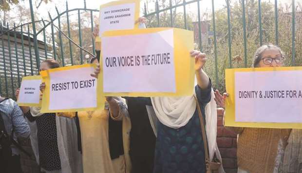 Women stage a demonstration demanding civil liberties and the release of detainees at Lal Chowk in Srinagar yesterday.