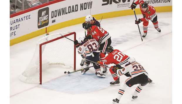 Chicago Blackhawks left wing Brandon Saad scores a goal against Edmonton Oilers centre Ryan Nugent-Hopkins during the third period. PICTURE: USA TODAY Sports