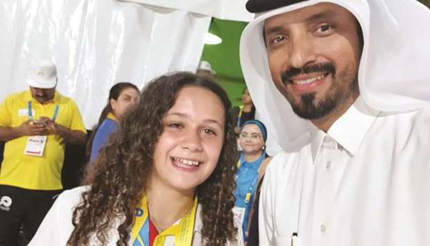 Farhan al-Sayed with a Spanish player who won the bronze medal at the skateboarding competition.