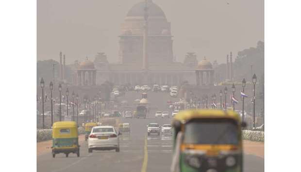 The area around the Rashtrapati Bhavan, presidential palace, and government buildings in New Delhi is enveloped in a blanket of smog yesterday.