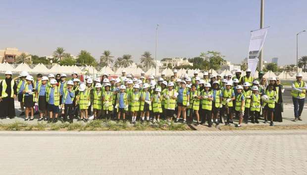 Students from Qatar International School who planted trees as part of u201cQatar Beautification and Our Kids Planting Treesu201d campaign.