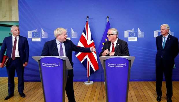 Britain's Prime Minister Boris Johnson, European Commission President Jean-Claude Juncker, European Union's chief Brexit negotiator Michel Barnier and Britain's Brexit Secretary Stephen Barclay