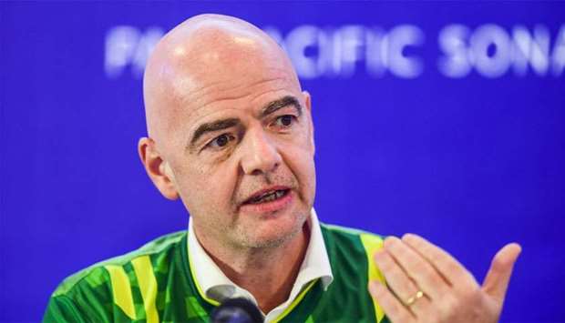 FIFA president Gianni Infantino gestures as he speaks during a press conference in Dhaka