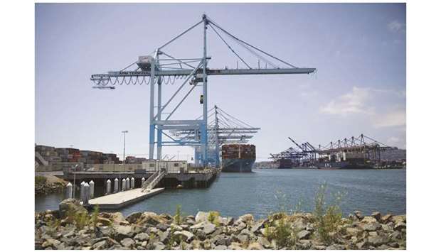 The Maersk Edinburgh cargo ship sits docked at the APM shipping terminal in the Port of Los Angeles in Los Angeles,  California (file). President Donald Trump juiced the economy last year with a $1.5tn package of tax cuts along with  increases in spending, especially for the military. But the effect has petered out in 2019, and concern that the economy could slide into recession is mounting.