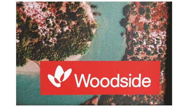 The logo for Woodside Petroleum, Australiau2019s top independent oil and gas company, adorns a promotional poster on display at a briefing for investors in Sydney. The  Australian firm said yesterday it is now targeting a final investment decision on the $20.5bn Browse project in the first half of 2021 as it continues to wrangle with its partners.