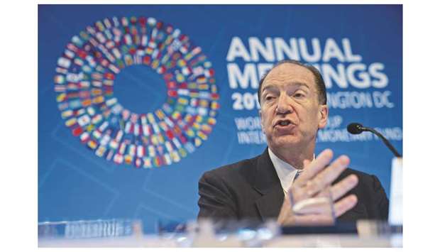 David Malpass, president of the World Bank Group, speaks at a news conference during the annual meetings of the IMF and World Bank Group in Washington, DC, yesterday. Malpass said Brexit uncertainty had been weighing on trade and the economic outlook for both Britain and the EU. Resolving the issue would have benefits for those economies and the developing world, he said.