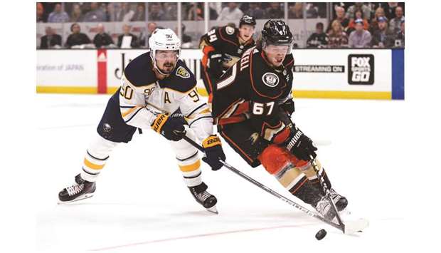Anaheim Ducks right wing Rickard Rakell (right) moves the puck against the Buffalo Sabres left wing Marcus Johansson during the second period. PICTURE: USA TODAY Sports