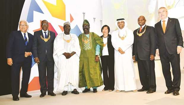 HE Sheikh Saoud bin Abdulrahman al-Thani (third from right) and other awardees with IOC President Dr Thomas Bach (right).
