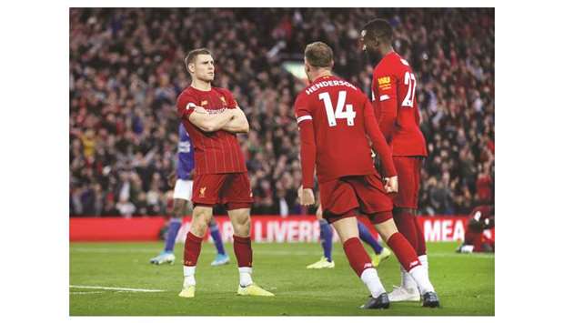In this October 5, 2019, picture, Liverpoolu2019s James Milner (left) celebrates after scoring a goal during the English Premier League match against against Leicester City at Anfield in Liverpool, England. (Reuters)