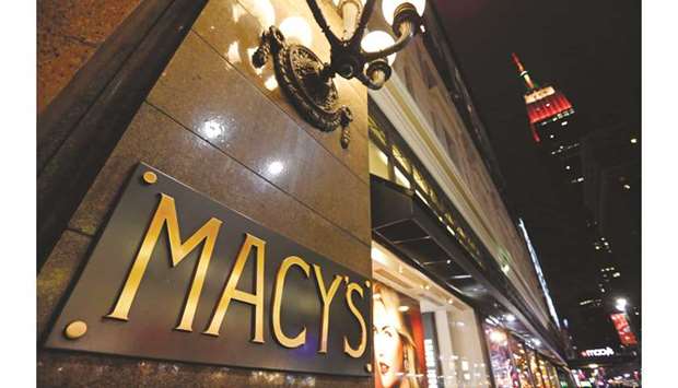 Macyu2019s signage is displayed outside the companyu2019s store in New York. Credit Suisse analyst Michael Binetti downgraded Macyu2019s, L Brands and Gap to underperform from neutral yesterday after his checks, along with commentary from Hugo Boss AG and Levi Strauss & Co suggested that US trends u201cremained sluggishu201d in the third quarter.