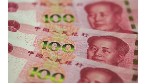 The yuan was barely changed against the dollar yesterday, even as data showed Chinau2019s growth slipped to its weakest in nearly three decades, with traders saying the outcome was not a surprise