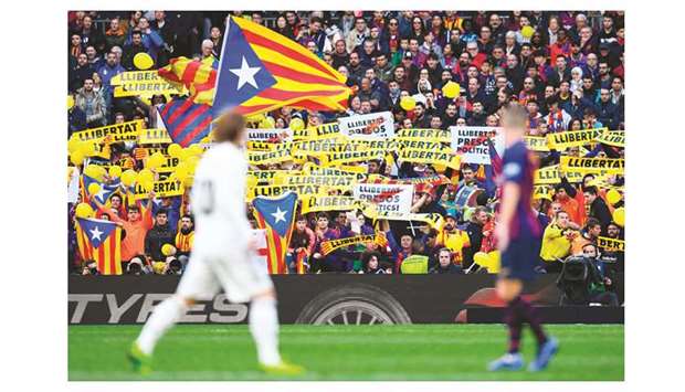 Barcelona fans hold up banners demanding freedom during the La Liga match between Barcelona and Real Madrid at the Camp Nou stadium in Barcelona in this file photo taken on October 28, 2018. (Reuters)