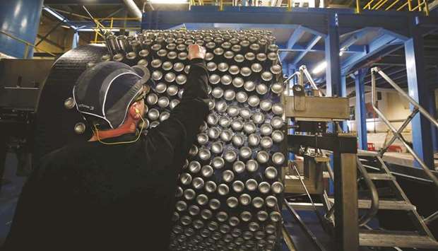 Aluminium cans leave the production line at Ball Corporation, Wakefield, Britain.