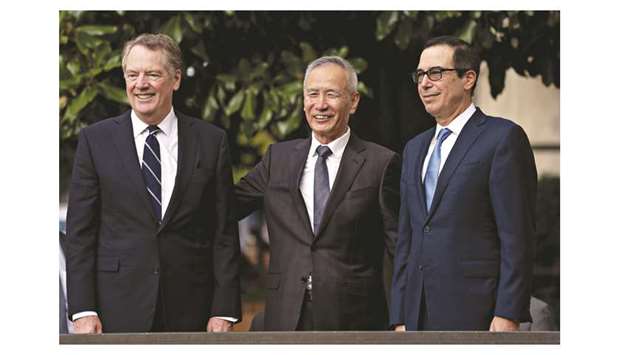 Liu He, Chinau2019s vice premier (centre), stands with Robert Lighthizer, US trade representative (left) and Steven Mnuchin, US Treasury secretary, in Washington (file). Liu reiterated that China is willing to work in concert with the US to address each otheru2019s core concerns on the basis of equality and mutual respect.