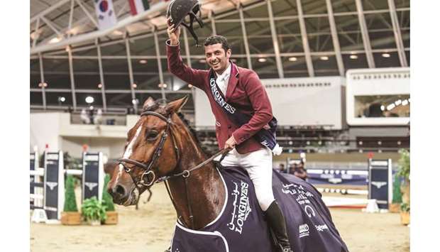 Big Tour winner Mohamed Sultan al-Suwaidi does a victory lap astride Happy Feet on winning the Big Tour of the first round of Hathab Longines Tour at Al Shaqab.