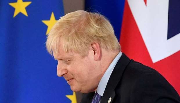 Britain's Prime Minister Boris Johnson leaves after attending a news conference at the European Union leaders summit dominated by Brexit, in Brussels, Belgium, on Thursday.