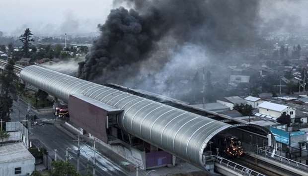 Aerial view of a burnt metro station after protests in Santiago yesterday