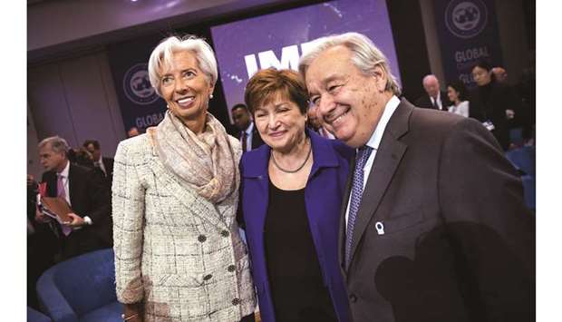Christine Lagarde, former managing director of the IMF and incoming president of the European Central Bank (left), stands for a photograph with Kristalina Georgieva, IMF managing director and Antonio Guterres, secretary-general of the United Nations, at the annual meetings of the IMF and World Bank Group in Washington, DC. u201cAll tools can be applied u2014 monetary policy where there is space for itu201d as well as fiscal measures and structural reforms when appropriate, IMF managing director Kristalina Georgieva said on Saturday at a press conference in Washington. Governments need to take these steps to stop or reverse the slowdown, she said.