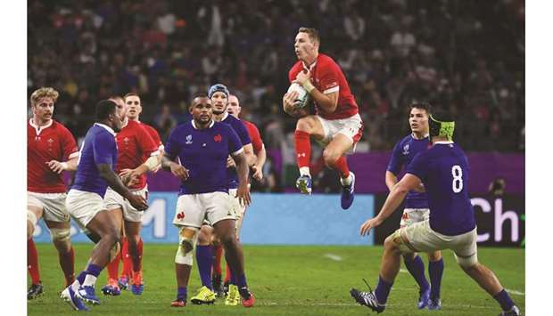 Walesu2019 full back Liam Williams catches the ball during their quarter-final match against France at the Oita Stadium in Oita, Japan, yesterday. (AFP)