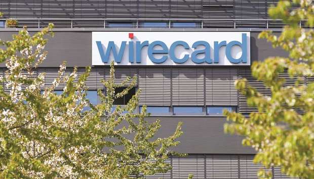 The Wirecard logo sits on the companyu2019s offices in the Aschheim district of Munich. Wirecard has been the target of a series of investigative reports by FT reporter Dan McCrum, with the latest, on October 15, knocking more than 20% off its share price.