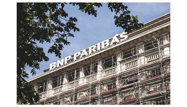 Construction scaffolding surrounds the BNP Paribas headquarters in Paris (file). BNP Paribas was the most exposed to credit risk with u20ac34bn of NPLs held in France and abroad, equal to a 4.3% NPL ratio at end-Dec, the Deloitte study says.