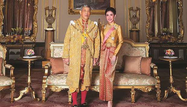 In this file photo, Thailandu2019s King Maha Vajiralongkorn poses with royal noble consort Sineenat Bilaskalayani, also known as Sineenat Wongvajirapakdi.