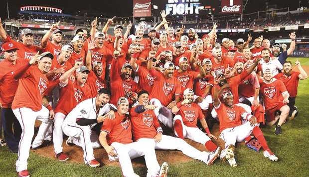 The Washington Nationals celebrate after defeating the Milwaukee Brewers in the National League Wild Card game at Nationals Park in Washington, DC. (AFP/GETTY IMAGES)