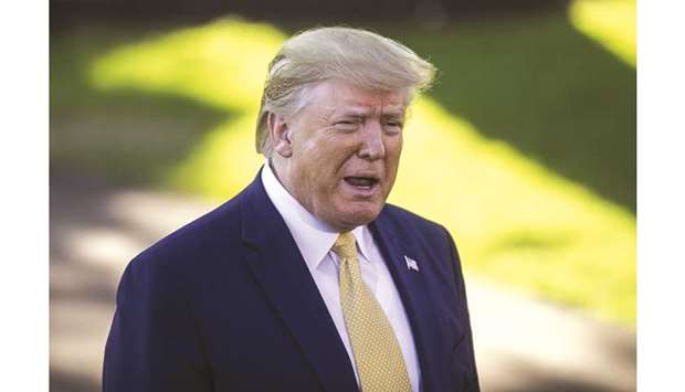 US President Donald Trump speaks to members of the media at the White House in Washington, DC. Trump remains upbeat on the chances Beijing and Washington will seal the mini-deal he announced earlier this month u2014 marking a cooling-off period in the two nationsu2019 damaging trade war.