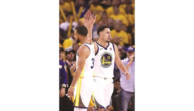 In this May 26, 2018, picture, Golden State Warriorsu2019 Klay Thompson (right) and Stephen Curry celebrate after a play against the Houston Rockets during Game Six of the Western Conference Finals in the 2018 NBA Playoffs in Oakland, United States. (AFP)