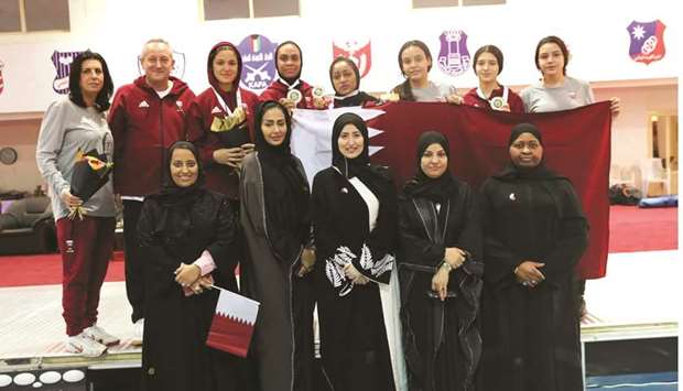 Qataru2019s fencing team with Lolwa al-Marri, President of Qatar Womenu2019s Sport Committee, and other members of the delegation after winning  silver at the 6th GCC Womenu2019s Games in Kuwait yesterday.