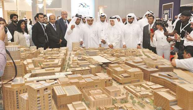 Dignitaries and officials at the Msheireb Properties booth.