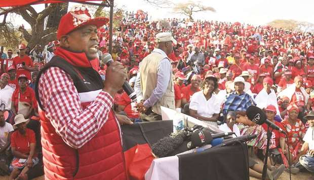 Botswana President Mokgweetsi Masisi addresses supporters during an election campaign rally in his home village of Moshupa yesterday.