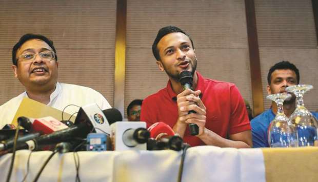 Bangladesh cricket team captain Shakib Al Hasan (centre) speaks at a press conference in Dhaka yesterday. (AFP)