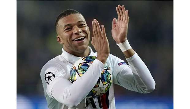 Paris Saint-Germainu2019s French forward Kylian Mbappe celebrates at the end of the match against Brugge on Tuesday.