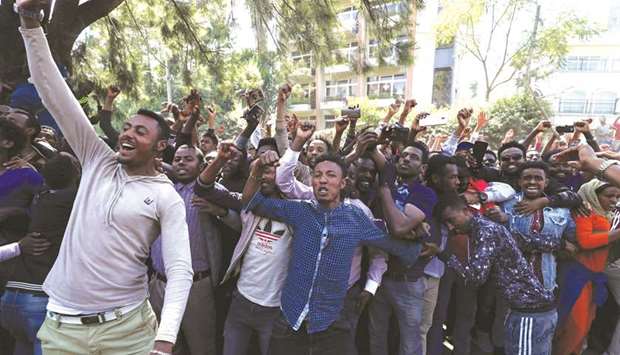 Oromo youth shout slogans outside Jawar Mohamedu2019s house, an Oromo activist and leader of the Oromo protest in Addis Ababa, yesterday.