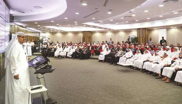 Ashghal officials and representatives of various companies at the workshop.