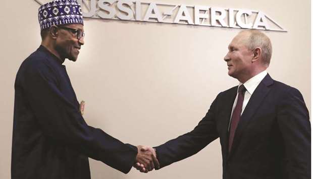 Russian President Vladimir Putin shakes hands with Nigeriau2019s President Muhammadu Buhari on the sidelines of the 2019 Russia-Africa Summit in Sochi yesterday.