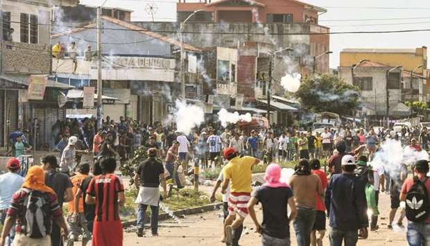 Demonstrators take part in clashes in Santa Cruz, Bolivia, yesterday.