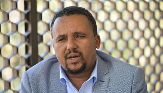 Ethiopian activist, Jawar Mohammed is photographed during an interview, in Addis Ababa