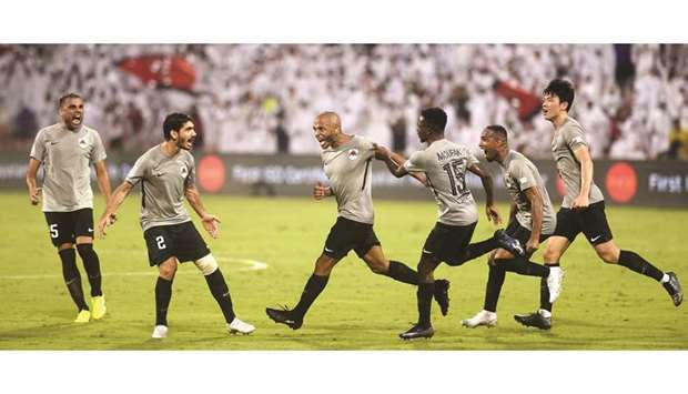 Al Rayyan players celebrate after  scoring against  Al Arabi in the QNB Stars League yesterday.